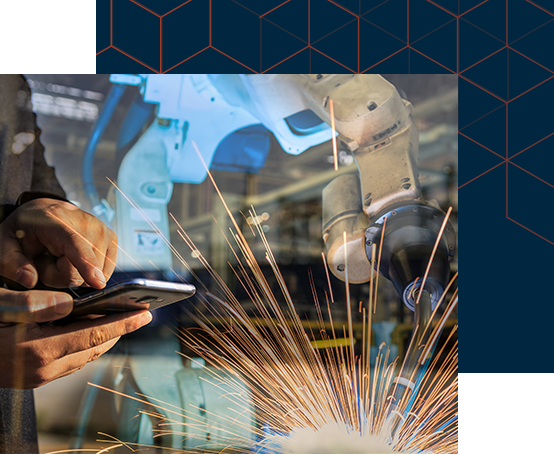 businessman is used smart phone control automate wireless Robot welding